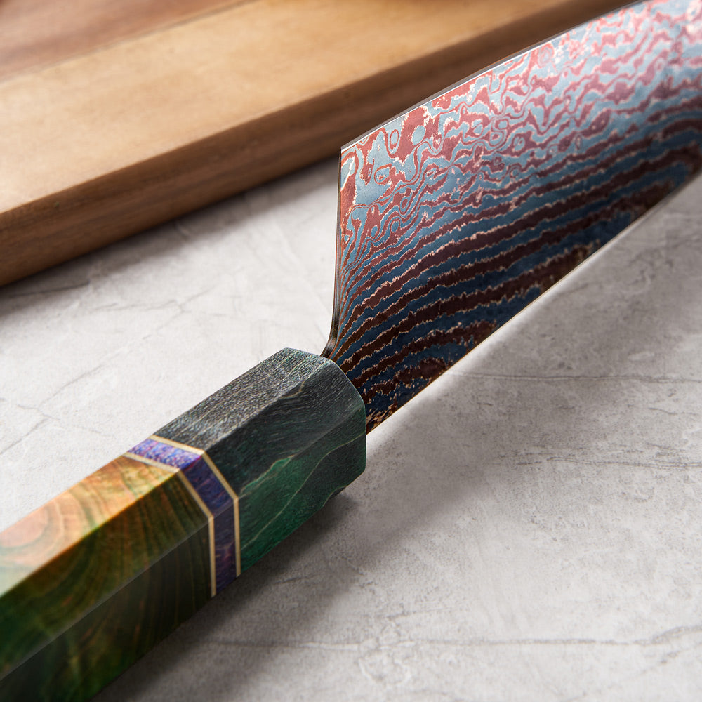 Close-up of a wooden knife handle with a textured surface on a concrete floor.