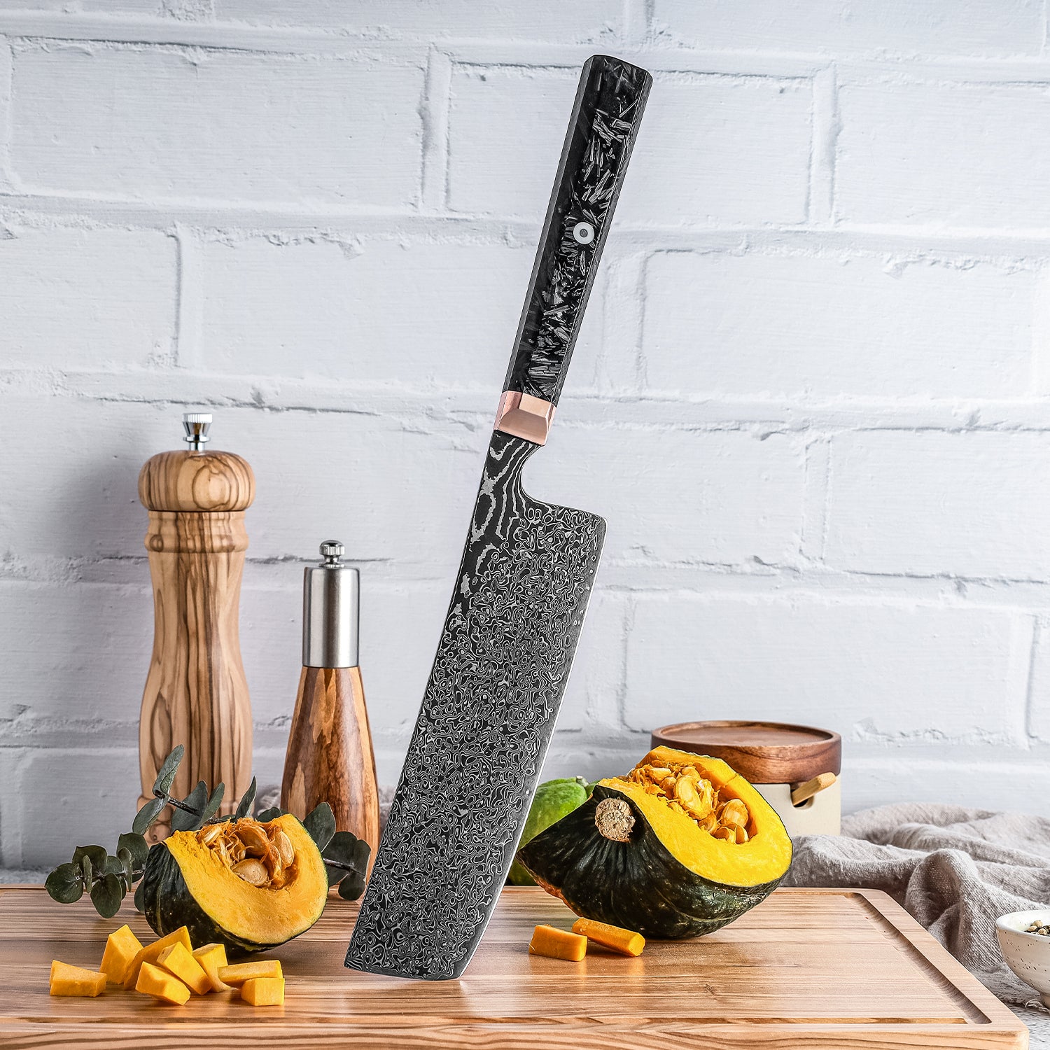Large nakiri vegetable knife with a decorative handle on a wooden cutting board with squash and spices