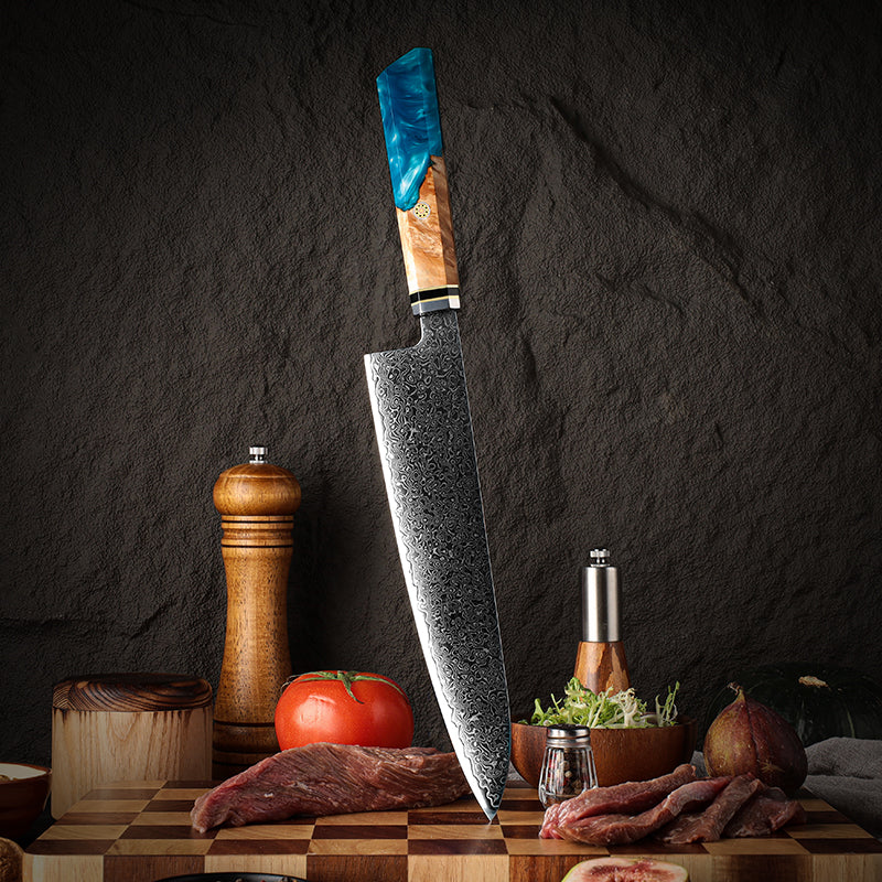 Large chef's knife with a decorative handle on a wooden cutting board with ingredients.