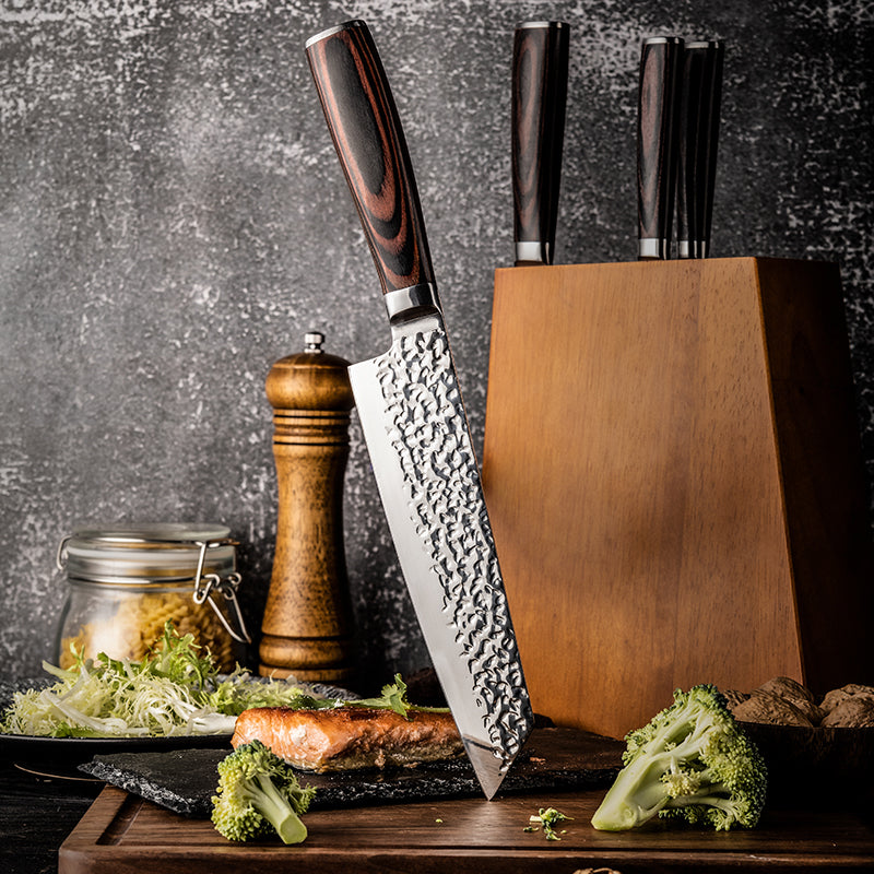 Hikari Professional Kiritsuke knife japanese knife on a wooden cutting board with vegetables